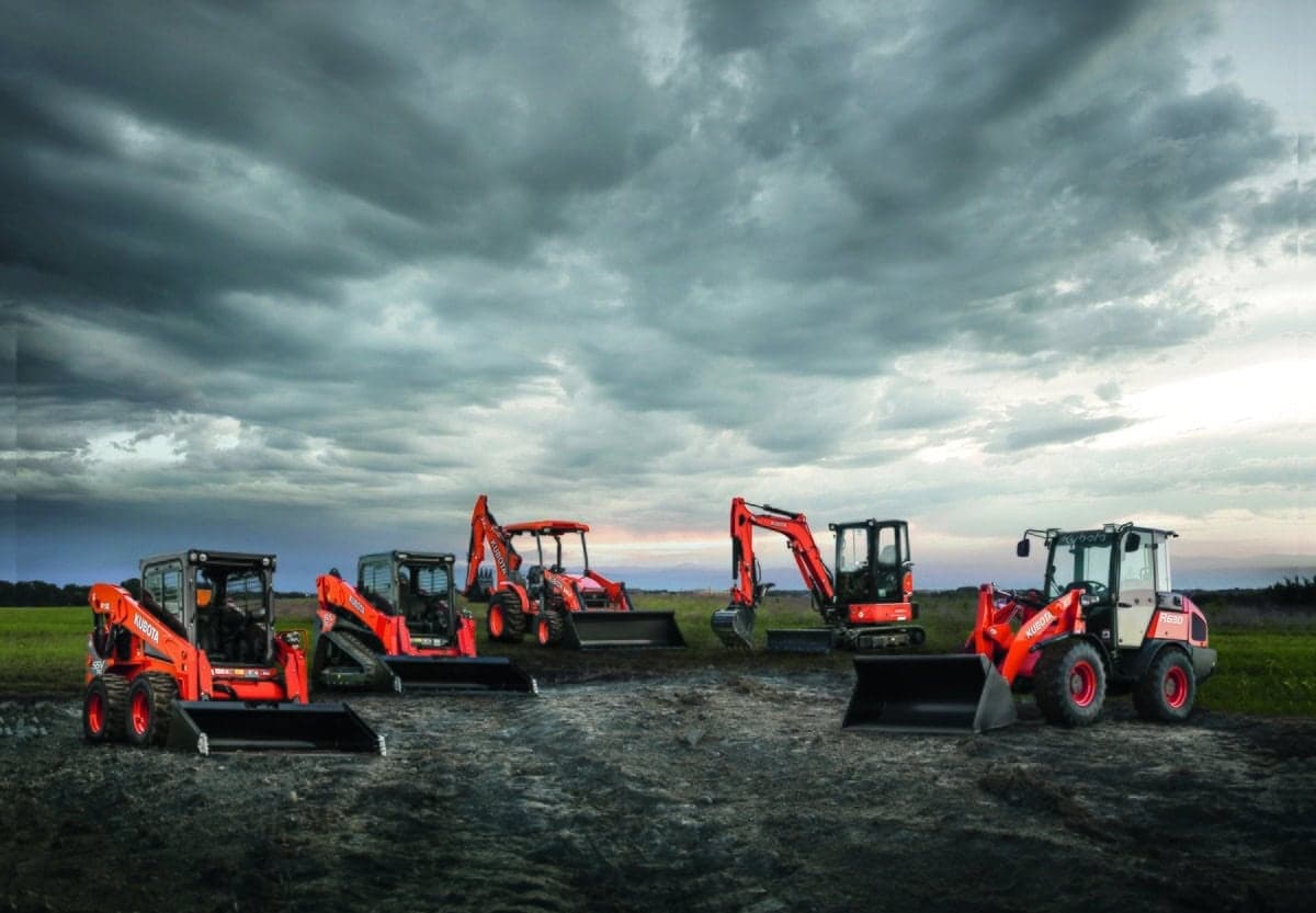 Kubota equipment lineup at dusk