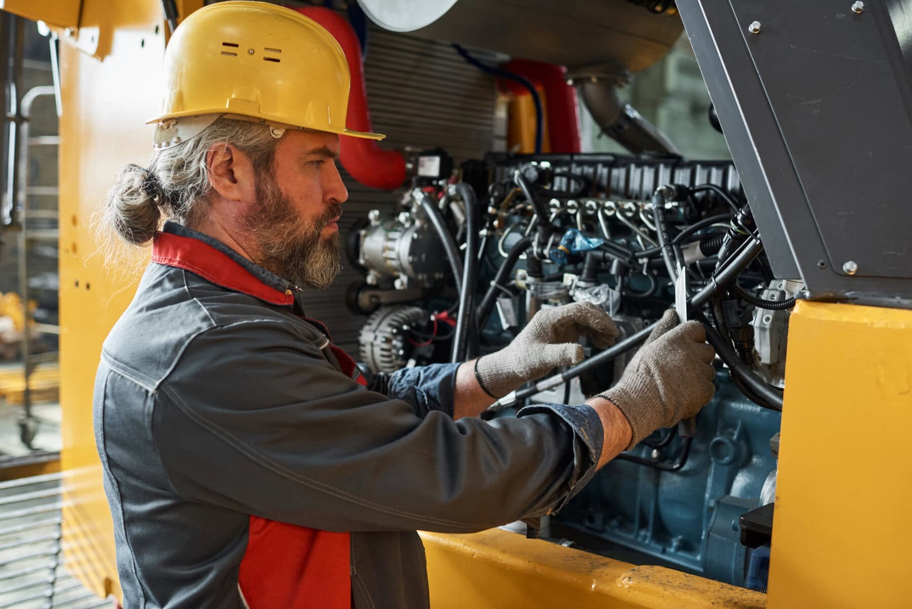 Sonsray technician servicing heavy equipment